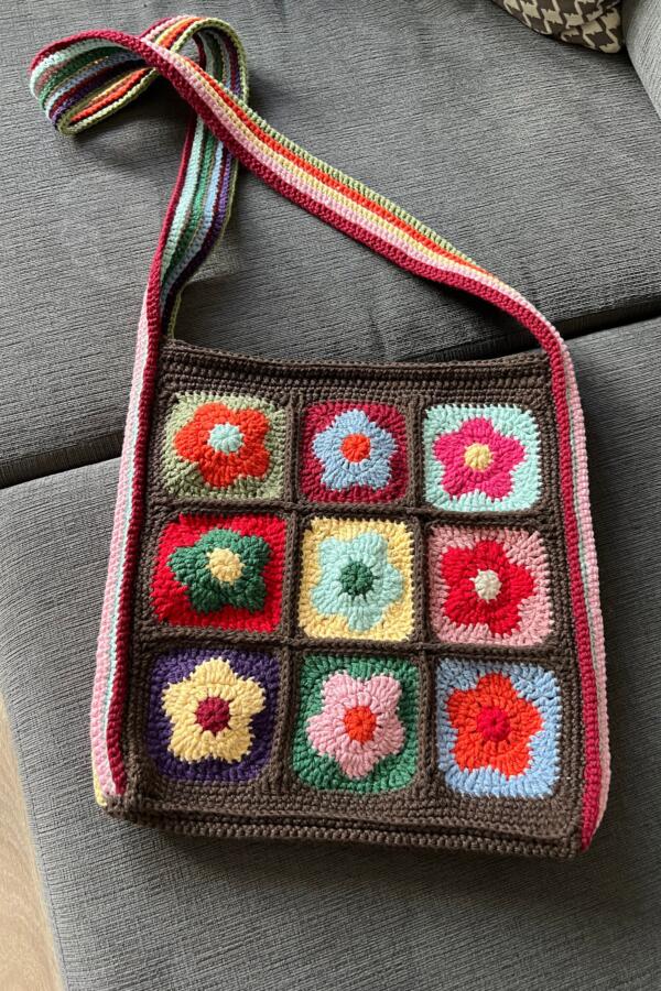 Handmade flower granny square crochet bag with colorful floral patterns